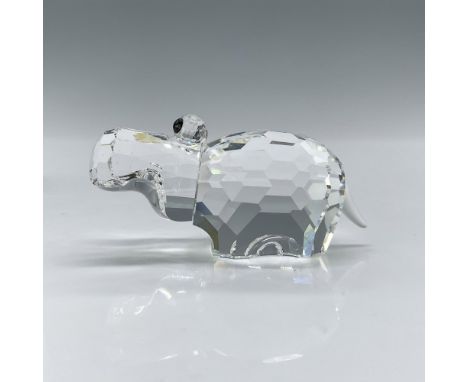 A small hippopotamus was part of the African Wildlife theme group. The hippo is made from clear crystal and has small black e