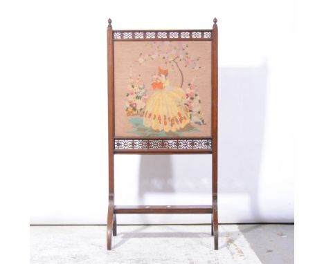 Edwardian mahogany fire screen, rectangular needlework panel, flanked by fretted borders, arched legs, width 54cm, height 110
