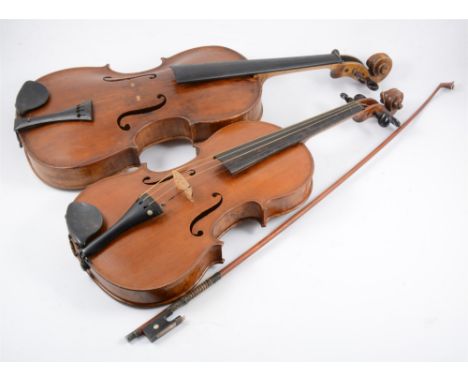 A violin with one piece maple back, circular ink stamp inside reading "Gilchrist of Glasgow", size of the back 14", cased, an