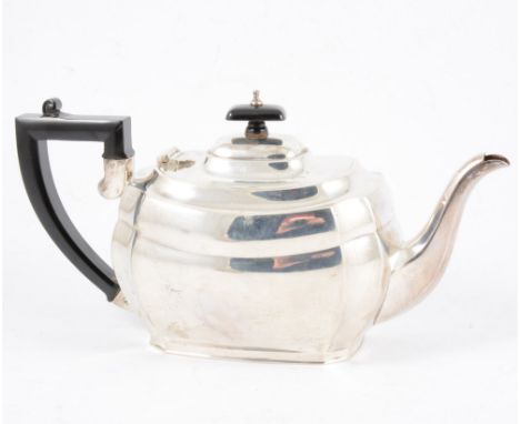 A silver teapot by S Blanckensee &amp; Son Ltd, Chester 1938, rectangular polished form with canted corners, approximate weig