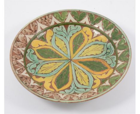 A Della Robbia of Birkenhead plate, incised and painted decoration, 19cm, (chipped).