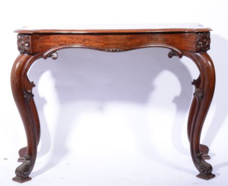 Victorian mahogany console table, serpentine top, scrolled frieze, cabriole legs with scrolled feet, width 126cm, depth 57cm,