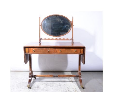 Regency style mahogany sofa table, rectangular top with rounded corners, two drop leaves, broad cross banding, reeded edge, t