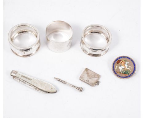 Three silver napkin rings (including Robinson &amp; Co Ltd, London, 1920), mother of pearl fruit knife with silver blade, sil