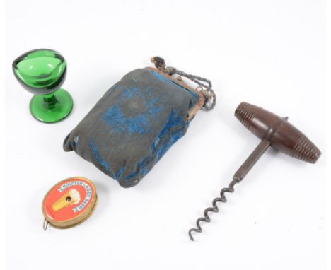 A quantity of glass medicinal measures, vintage corkscrew, Indian cast brass table bell, etc.