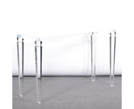 A lucite console table, rectangular top with glass inset, on tapering square-section supports, width 122cm, depth 42cm, heigh