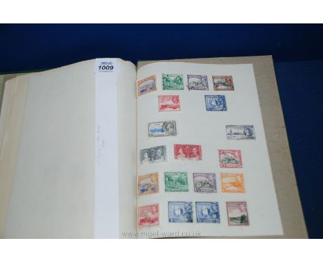 A green Bramptons Stamp Album. British Empire and Common Wealth mix, King Edward VII - King George VI, particularly Australia