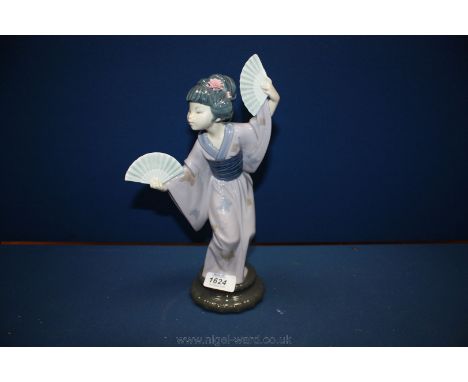 A Lladro figurine of a Geisha with fans, model #4991.