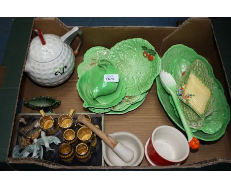 A box of miscellaneous china including Carlton ware Cabbage plates and dishes, Wade beakers, three flying birds, two small Le