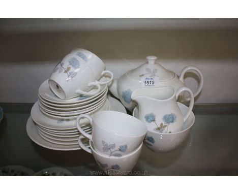A Wedgwood 'Ice Rose' part Teaset including six saucers and tea plates, four cups, teapot, milk jug, sugar bowl and cake plat