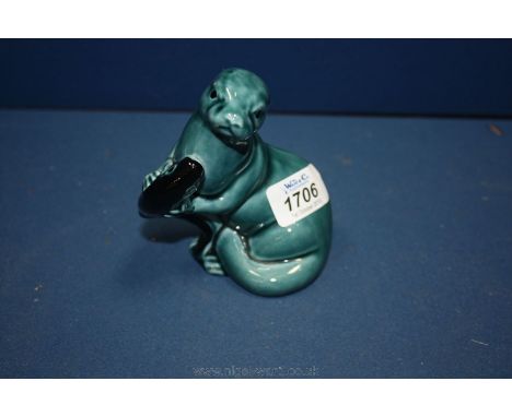 A Poole pottery Otter, 4 1/2" tall.