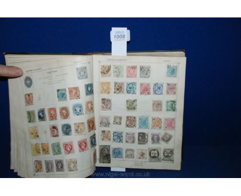 A green Strand Stamp Album. Broad world mix, Queen Victoria - King George V, some picking but interest remains in Austria, Ge