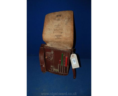An early to mid 20th c. Hikers Ordinance Case with contents including compasses, whistle, fire lighter, maps, dressings, etc.