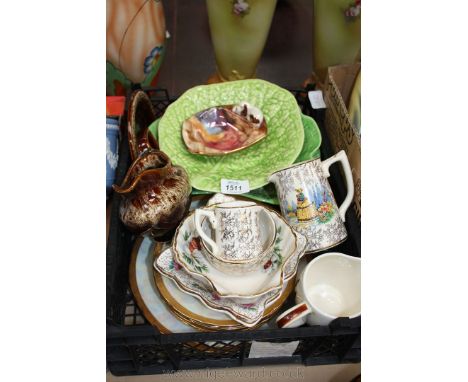 A quantity of china including leaf dishes, dish with dog, gravy boat and stand, shell and roses pattern dish, Sadler water ju