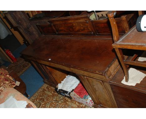 An early 19th c. Mahogany Sideboard, having three panel upstand back with moulded detail, rectangular top over wide central p