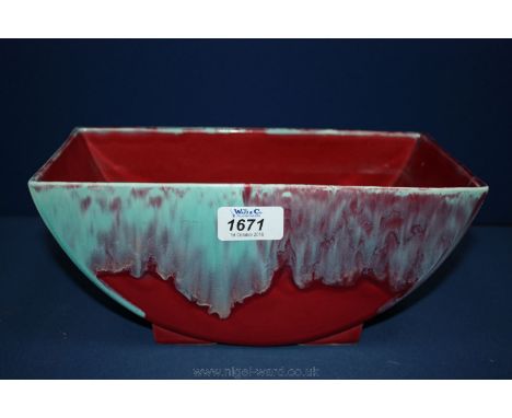 An Art Deco flower trough with Ruskin style glaze.