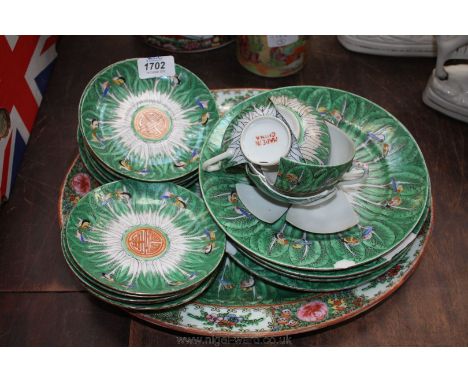 A quantity of Chinese porcelain, early 20th c., Famille Verte saucers, plates and an oval dish, no cups surviving