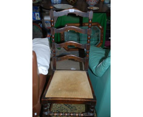 A set of five Carolinian style Oak Dining Chairs having four rung ladder-backs in bobbin turned supports, mustard yellow velv