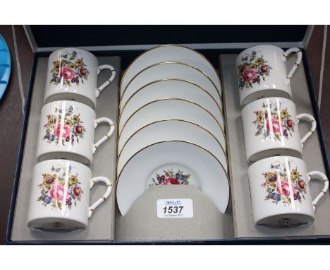 A boxed Royal Worcester Coffee set in floral design.