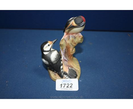 A Royal Worcester figure of Pied Woodpeckers by Eva Soper, no. 3363, 4 1/2'' tall.