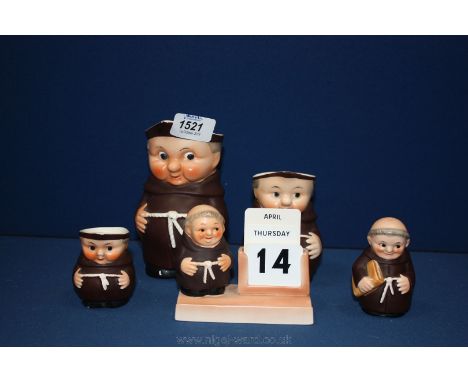 Five pieces of Goebel china including three Monk jugs, a Monk calendar and a Monk salt pot.