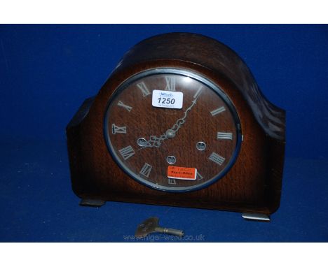 An Oak cased Smith's Mantle Clock with Westminster chimes.