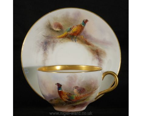 A Royal Worcester Pheasant Cup and saucer by James Stinton, date mark 1918.