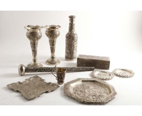 INDIAN SILVER:- A bottle-shaped flask with stopper, a pair of vases, a parasol handle, four small dishes/trays, a small tot c