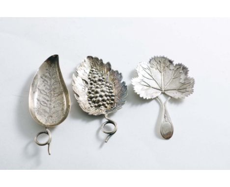 A GEORGE III CADDY SPOON with a vine leaf bowl, part matt, part polished, by Matthew Linwood, Birmingham 1808 and two other G