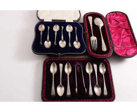 THREE CASED SETS:- A set of six late Victorian engraved tea spoons and a pair of sugar tongs, a set of six Dutch coffee spoon