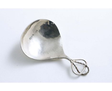 AN EARLY 20TH CENTURY ARTS &amp; CRAFTS CADDY SPOON with a hammered finish and a wire-work handle, by Charles John Plucknett,