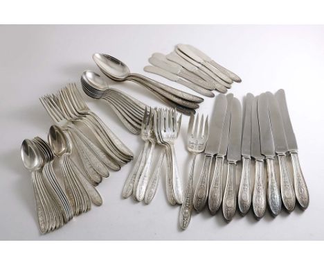 AN EARLY 20TH CENTURY NORTH AMERICAN PART-CANTEEN OF FLATWARE &amp; CUTLERY with stamped decoration up the stems and an urn m