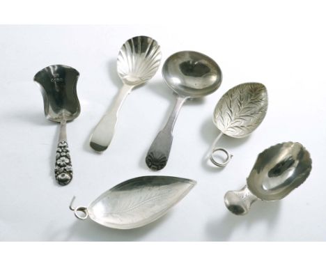 SIX VARIOUS CADDY SPOONS:- Two George III examples with leaf bowls, a Fiddle &amp; Shell example, a Fiddle example, a Victori