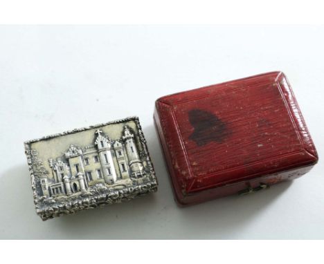 AN EARLY VICTORIAN SILVERGILT "CASTLETOP" VINAIGRETTE rectangular with chased convex sides &amp; an engine-turned base, the c