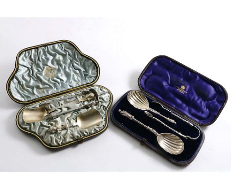 A VICTORIAN PARCELGILT TEA CADDY SPOON, SUGAR SPOON &amp; PAIR OF SUGAR TONGS TO MATCH in the Egyptian revival manner, by Hil