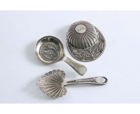FILIGREE:- A George III jockey cap caddy spoon, initialled "R.E.C", unmarked, Birmingham- made 1815-20, a caddy spoon with a 