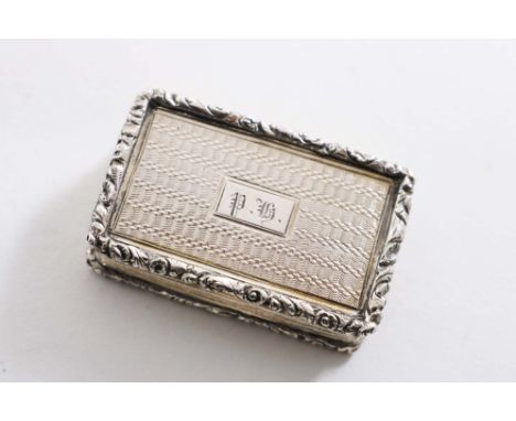 A WILLIAM IV RECTANGULAR VINAIGRETTE with engine-turning, reeded sides and raised floral borders, the cover initialled "PH", 
