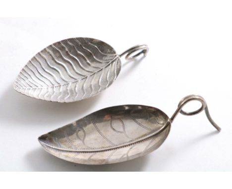 A GEORGE III CADDY SPOON with a veined leaf bowl and a wire tendril handle, by Elisabeth Morley, London 1800 and another leaf