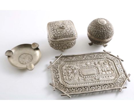 A SMALL INDIAN TRAY of canted rectagular outline with pierced &amp; chased detail, an Indian globular box, crested, and India