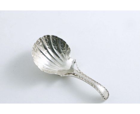 A GEORGE III CADDY SPOON with a bright-cut openwork stem and a chased and fluted shell bowl, by George Smith, London c.1775 (