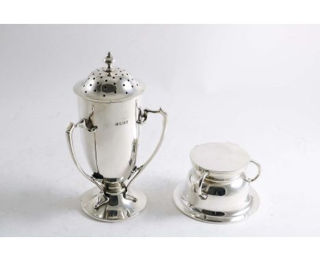 AN EDWARDIAN DOMED CIRCULAR INKWELL with a flat cover and three c-shaped flying buttresses (glass liners) by West and Sons, D