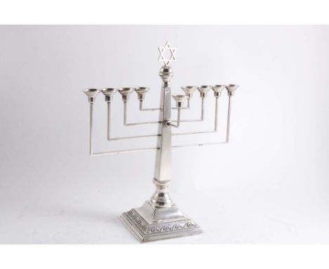 A MID 20TH CENTURY MENORAH on a bevelled square base with tapering column, angular branches and a detachable "slave" light, m