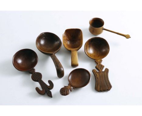 WOOD:- Two 19th century caddy spoons with carved &amp; shaped handles, one with a turned wooden handle, two scoops and a smal