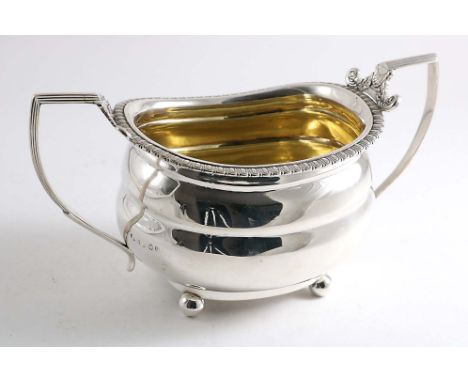 A GEORGE IV PROVINCIAL TWO-HANDLED SUGAR BASIN  on ball feet, with an ovolo border &amp; gilt interior, by J. Barber &amp; W.