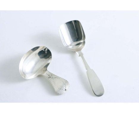 NEWCASTLE:- A George III caddy spoon with an engraved lug handle by James Thompson, 1795-1800 (no town mark, no date letter) 