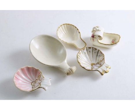 CERAMIC:- Two Spode "Shell" caddy spoons with gilded highlights, a Copeland "Shell" spoon with gilt border, a Coalport caddy 