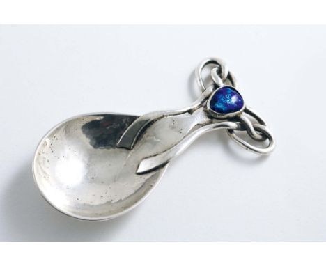 AN EDWARDIAN ARTS &amp; CRAFTS CADDY SPOON with a hammered finish, a drop-shaped bowl and an interlaced tendril handle set wi