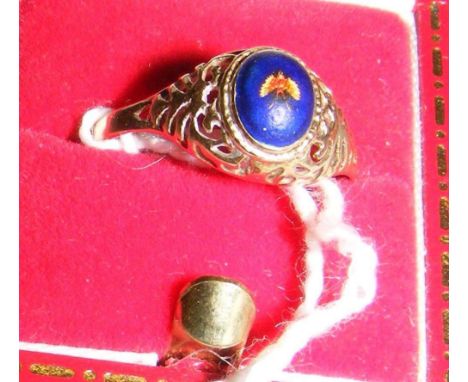 Gold ring with enamel inset motif
