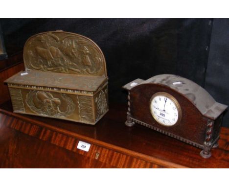 Oak cased mantel clock timepiece and an embossed brass candle box