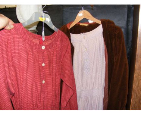 A vintage 1970's Laura Ashley brown corduroy cape and two long cotton dresses